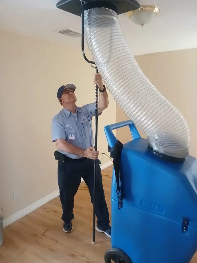 Mini Split Installation technician using HEPA equipment in Palm City